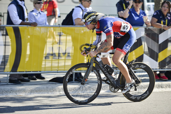 160509-F-WU507-016: A Team US wounded warrior cyclist races in the cycling finals at the 2016 Invictus Games at the ESPN Wide World of Sports complex at Walt Disney World, Orlando, Fla., May 9, 2016. The 2016 Invictus Games officially kicked off with the ceremony May 8, and 15 nations will compete through May 12 in multiple adaptive sports events. (U.S. Air Force photo by Senior Master Sgt. Kevin Wallace/RELEASED)